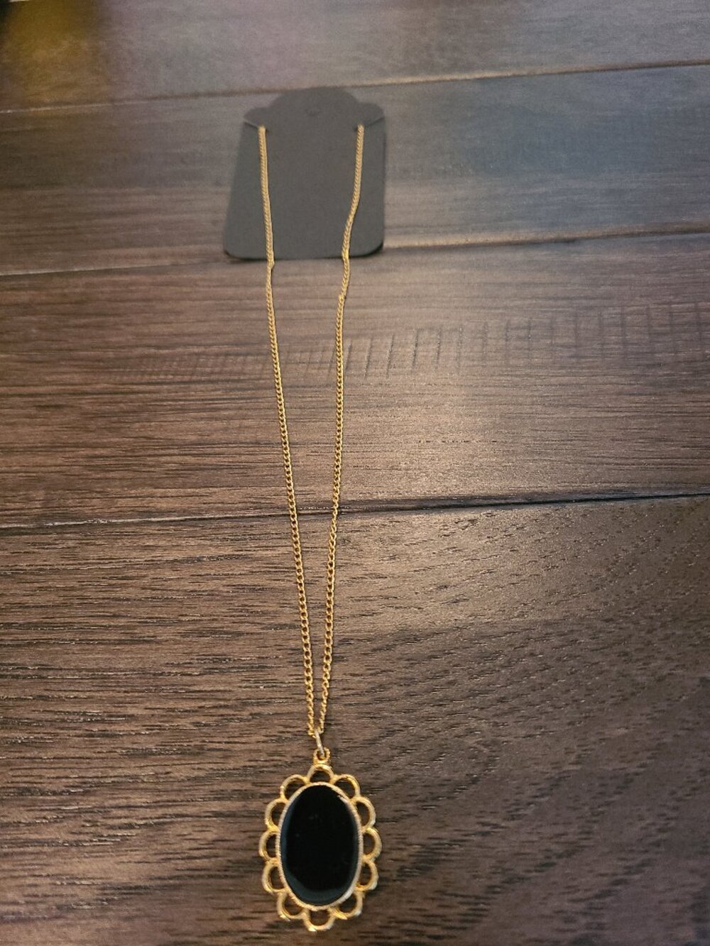 Vintage 1960s necklace - black charm and goldtone chain